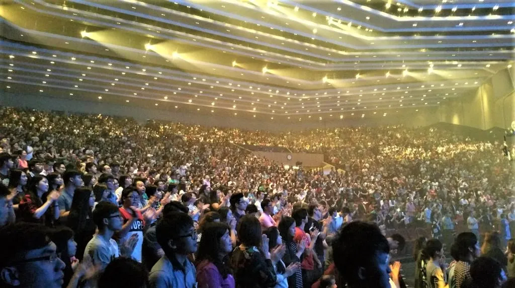 Crowd clapping in the Auditorium's upper seating levels
