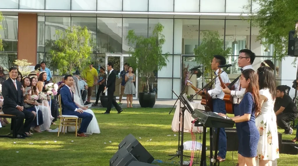 Band and singers performing at a wedding in the Garden