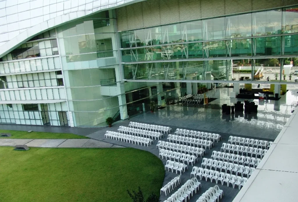 Rows of white chairs on the terrace by the Garden, seen from above