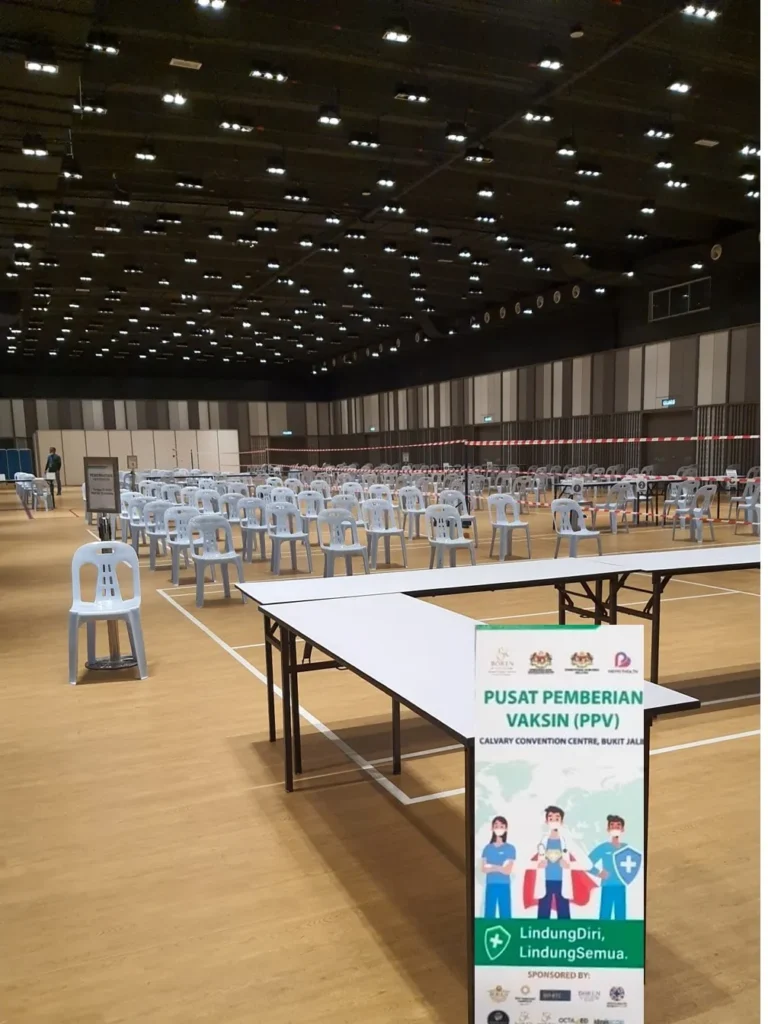 Registration tables and waiting chairs set up as a vaccination centre (PPV) in the Multipurpose Banquet Hall